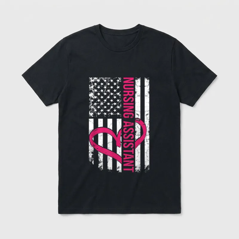 Nurse Flag T-Shirt – Distressed American flag with pink heart and NURSING ASSISTANT text – Classic T-Shirt in Black