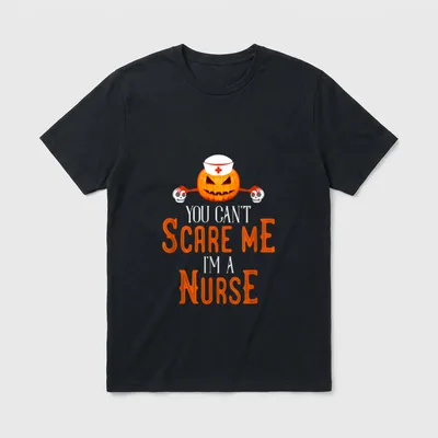 Scare Me I'm a Nurse T-Shirt – Carved pumpkin wearing a nurse cap holding skulls – Classic T-Shirt in Black