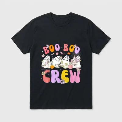 Groovy Halloween Boo Crew Nurse T-Shirt – Cute ghost nurses with pumpkins and BOO BOO CREW text – Classic T-Shirt in Black