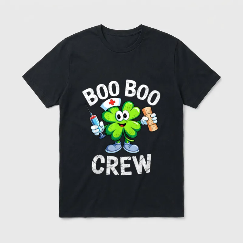 Boo Boo Crew St Day Nurse T-Shirt – Cartoon shamrock nurse holding syringe and bandage – Classic T-Shirt in Black