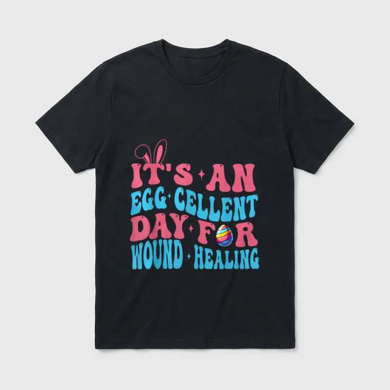 Wound Care Nurse Easter Day WOCN T-Shirt – Text reading IT'S AN EGG CELLENT DAY FOR WOUND HEALING – Classic T-Shirt in Black