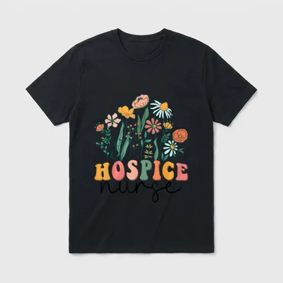 Groovy Wildflower Hospice Nurse T-Shirt – Wildflowers above colorful Hospice text and nurse script – Classic T-Shirt in Black