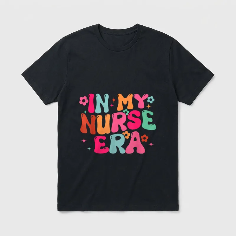 In My Nurse Era RN Nursing T-Shirt – IN MY NURSE ERA printed in colorful retro bubble letters – Classic T-Shirt in Black