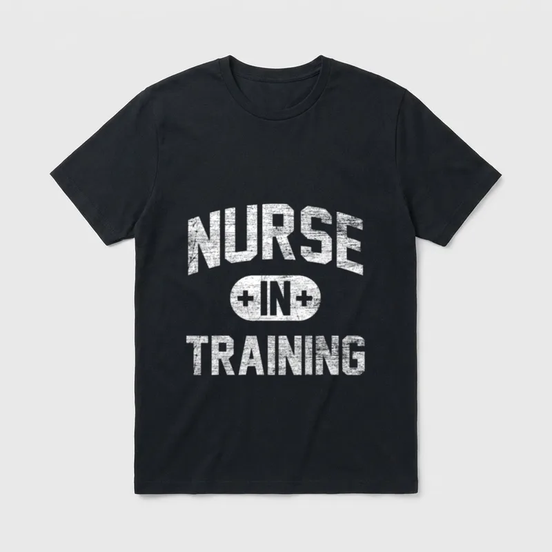 Nurse in Training T-Shirt – Distressed white text reading NURSE and TRAINING around an IN badge – Classic T-Shirt in Black