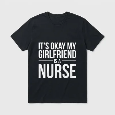 My Girlfriend Is a Nurse Nursing T-Shirt – White text reading “IT’S OKAY MY GIRLFRIEND IS A NURSE” – Classic T-Shirt in Black