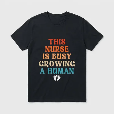 Pregnancy Nurse Announcement Cute Pregnant T-Shirt – “THIS NURSE IS BUSY GROWING A HUMAN” – Classic T-Shirt in Black