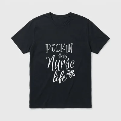 Rockin This Life Cute Nurse T-Shirt – ROCKIN' this Nurse life text and a small flower graphic – Classic T-Shirt in Black