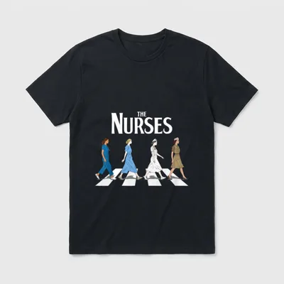 Retro Nurse Nurse Week T-Shirt – “THE NURSES” text above four nurses walking on a zebra crosswalk – Classic T-Shirt in Black