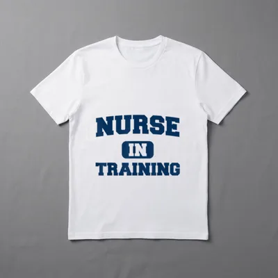 Future Nurse in Training T-Shirt – Varsity letters reading NURSE IN TRAINING with a centered badge – Classic T-Shirt in Black