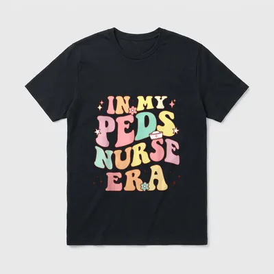 In My PEDS Nurse Era Retro T-Shirt – Retro lettering reading IN MY PEDS NURSE ERA with a nurse cap – Classic T-Shirt in Black
